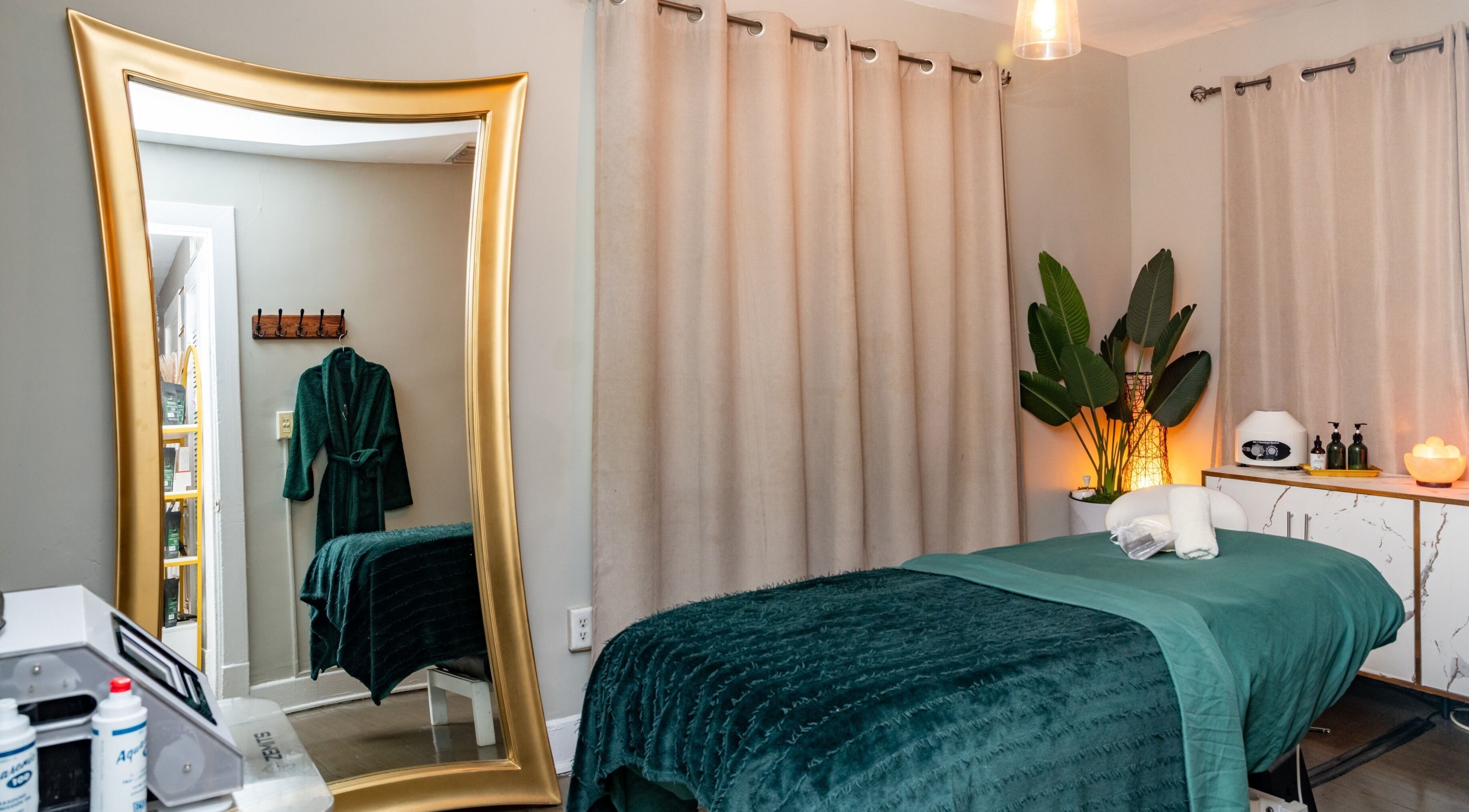 Luxurious treatment room at The Shape Spa in Miami Beach, Florida featuring a plush bed and elegant decor.