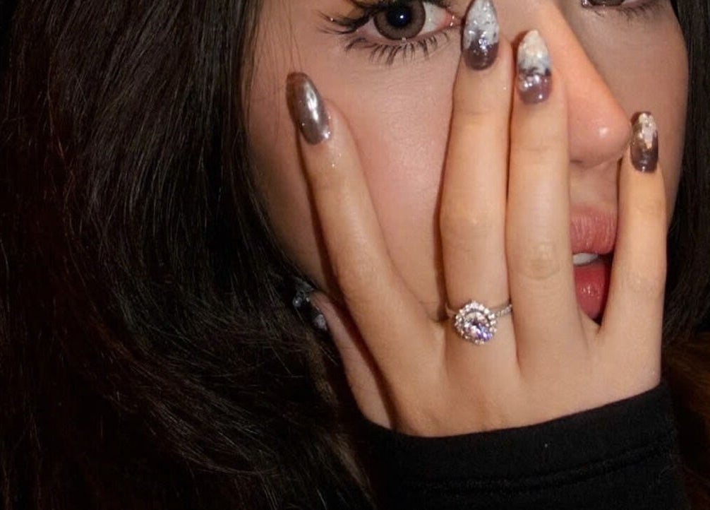 Glamorous silver nail art at Ladylux de Beaute, Melbourne, Victoria, AU with elegant jewelry.