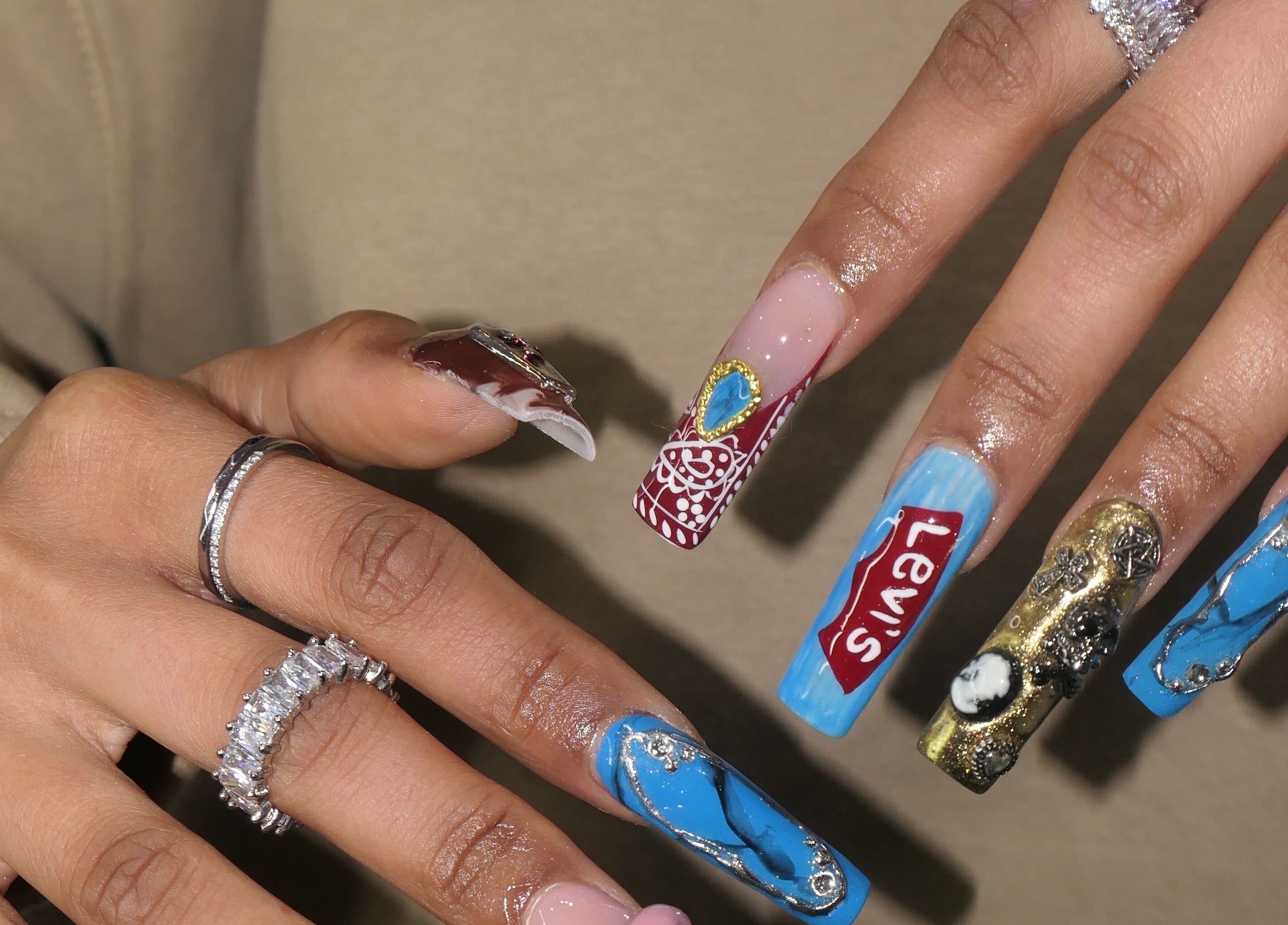 Stylish, artistic nails with intricate designs at Ladylux de Beaute, Melbourne, Victoria, AU.