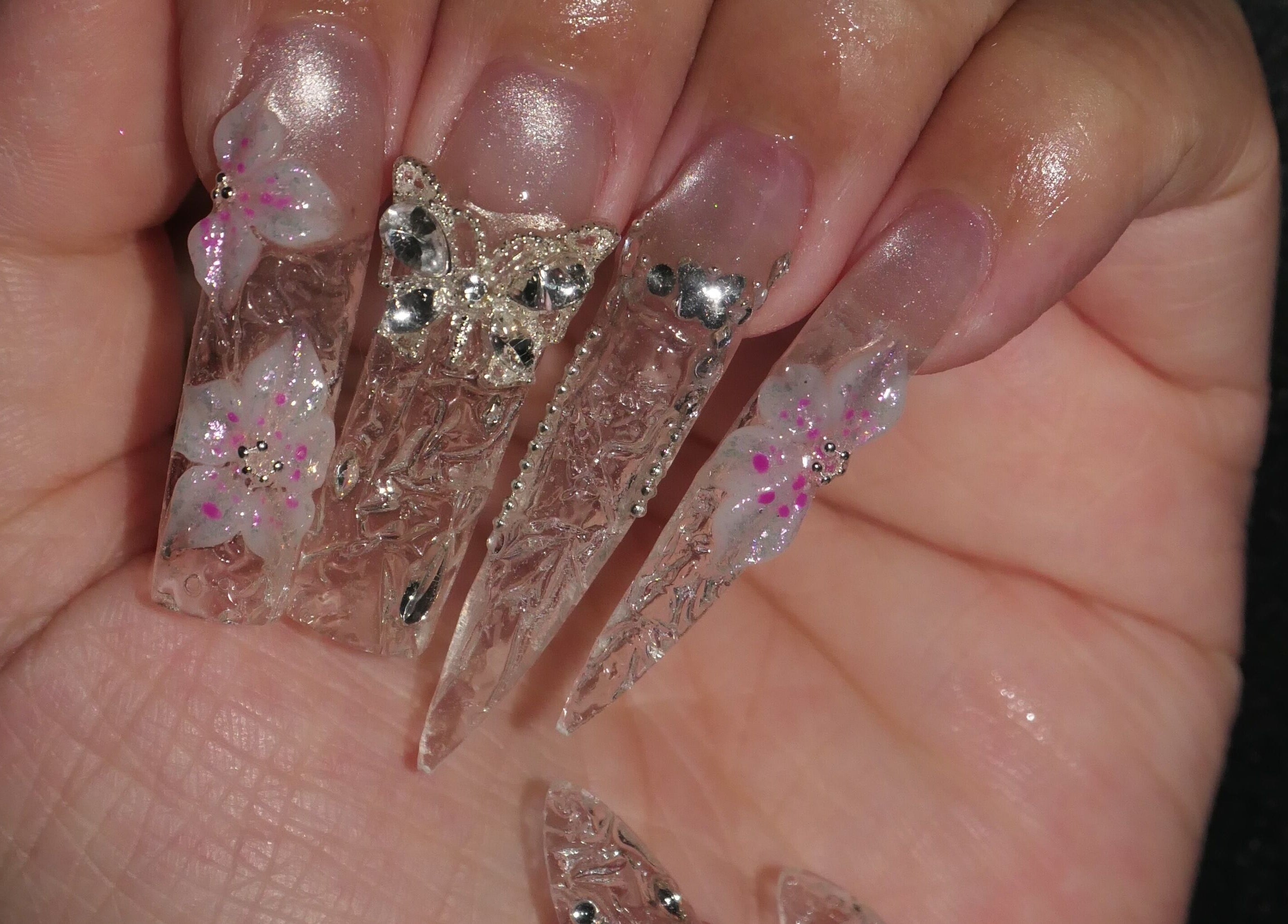 Intricate nail art with flowers and gems at Ladylux de Beaute, Melbourne, Victoria, AU.