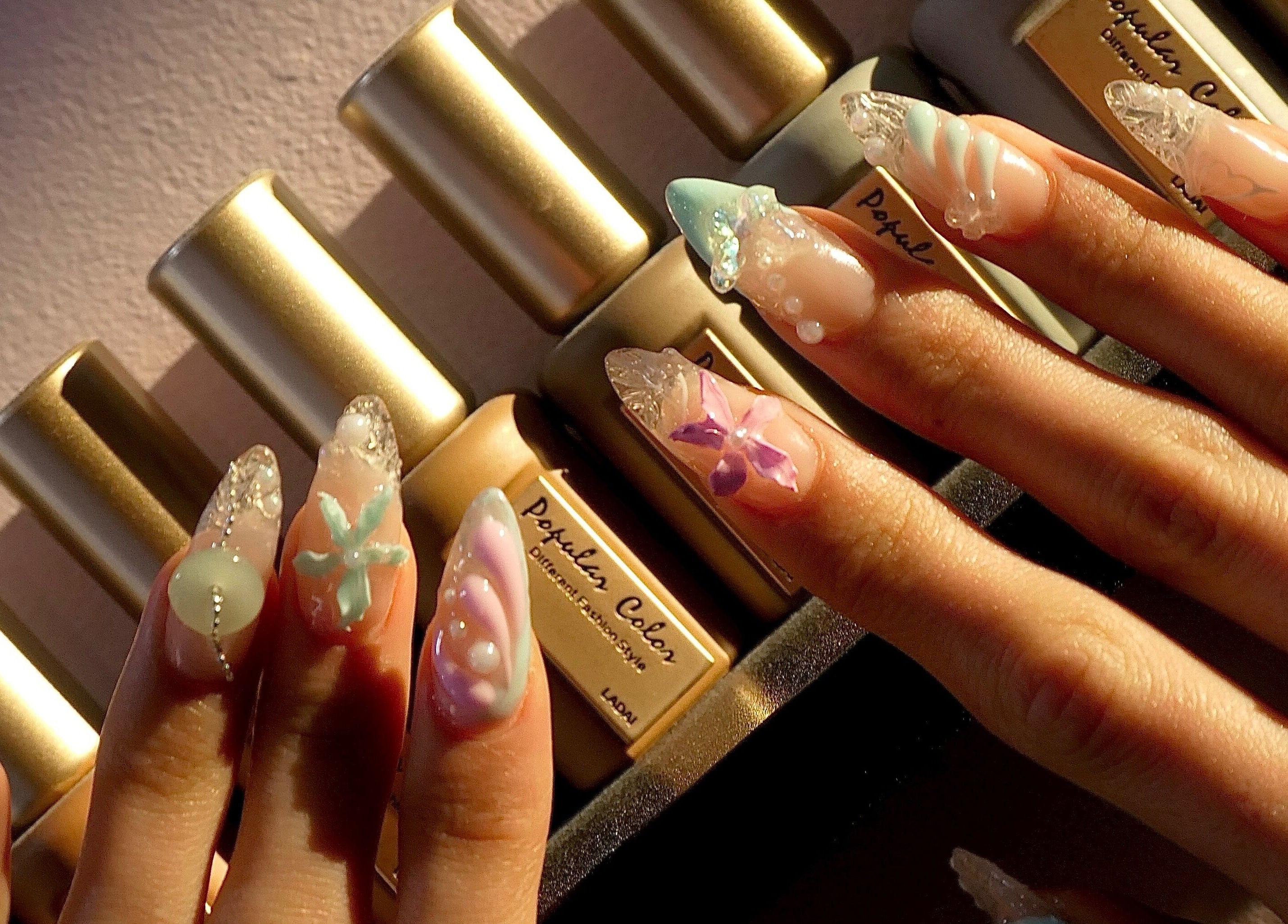 Intricate nail art at Ladylux de Beaute, Melbourne, Victoria, AU showcasing vibrant creativity.