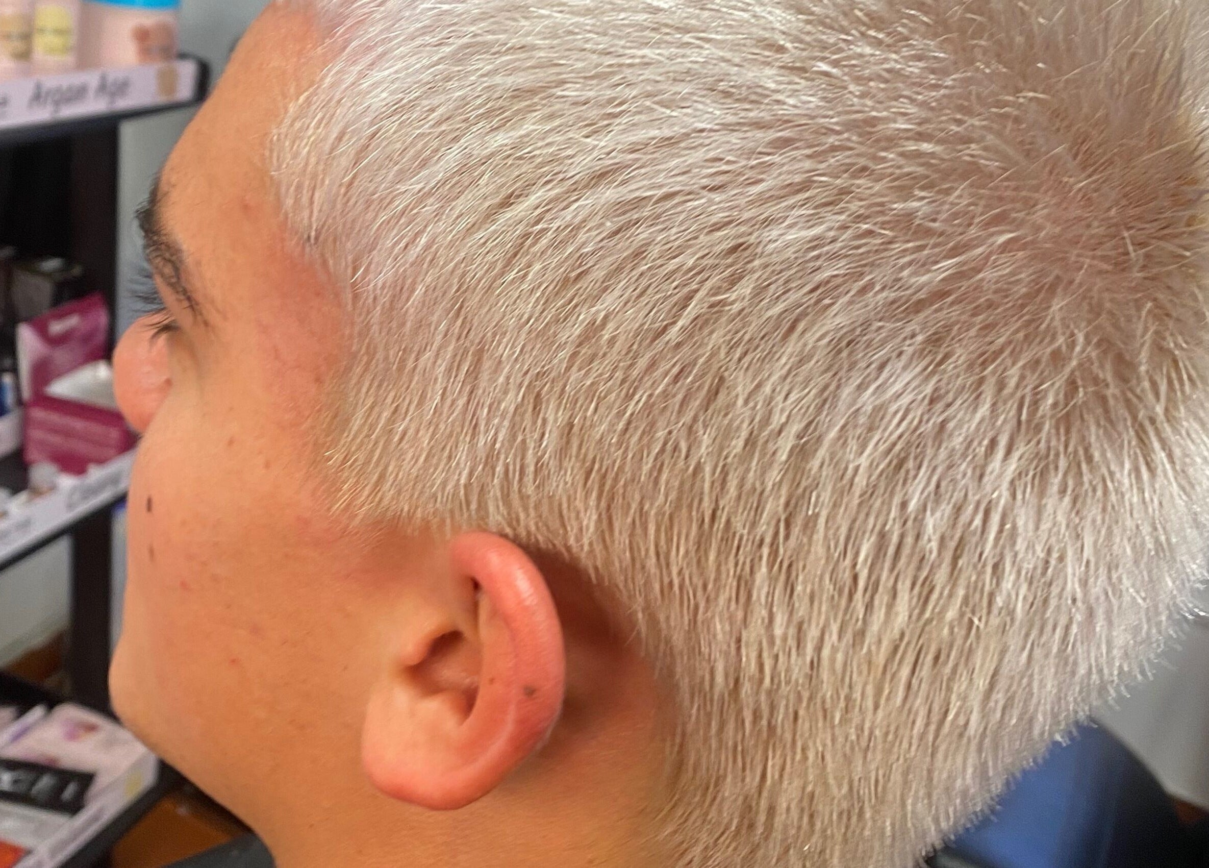 Close-up of platinum-blonde haircut at Hair Trendz by Crystal, Ballito, Kwazulu-natal, ZA. Modern and chic salon styling.