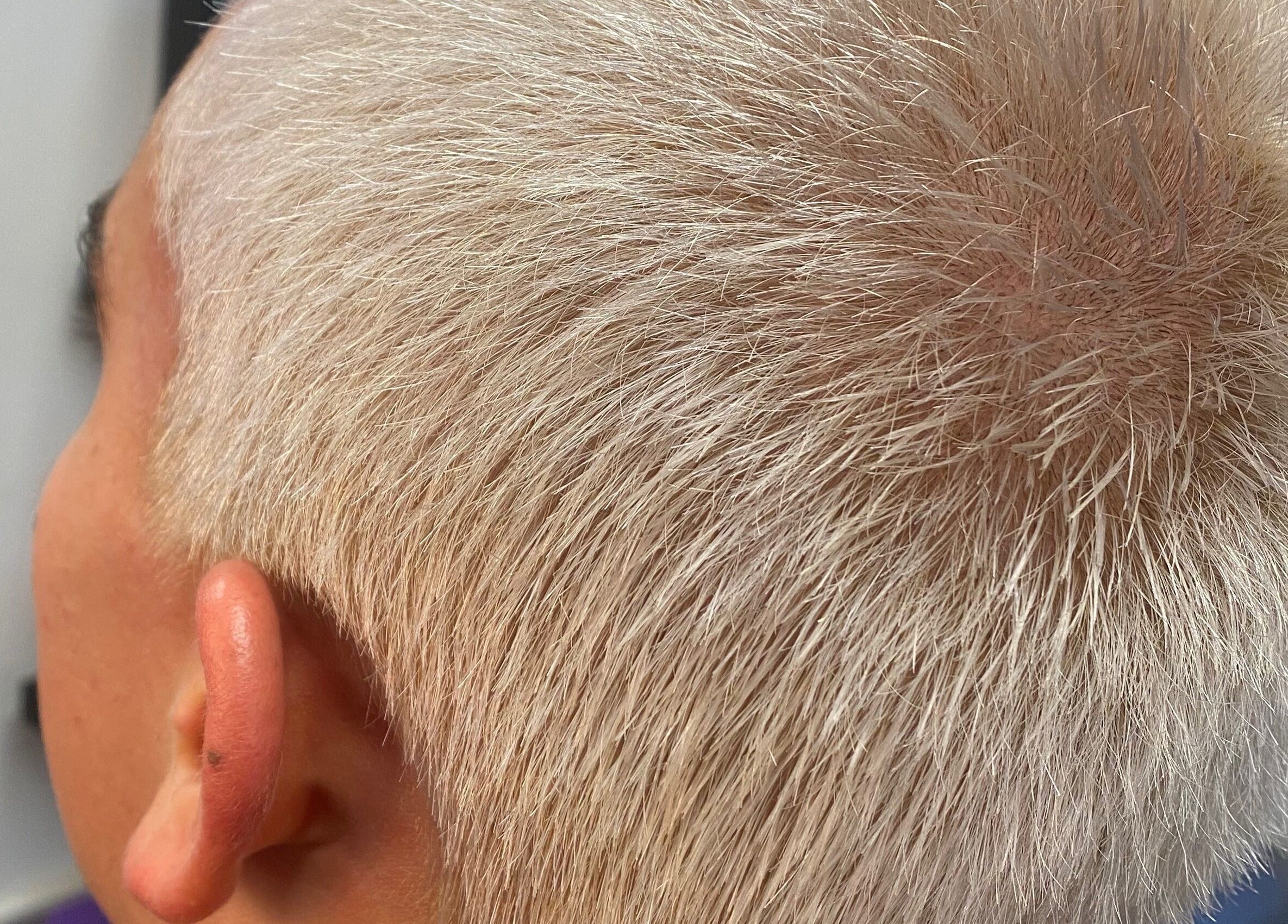 Close-up of a trendy blonde hairstyle at Hair Trendz by Crystal, Ballito, Kwazulu-Natal, ZA.