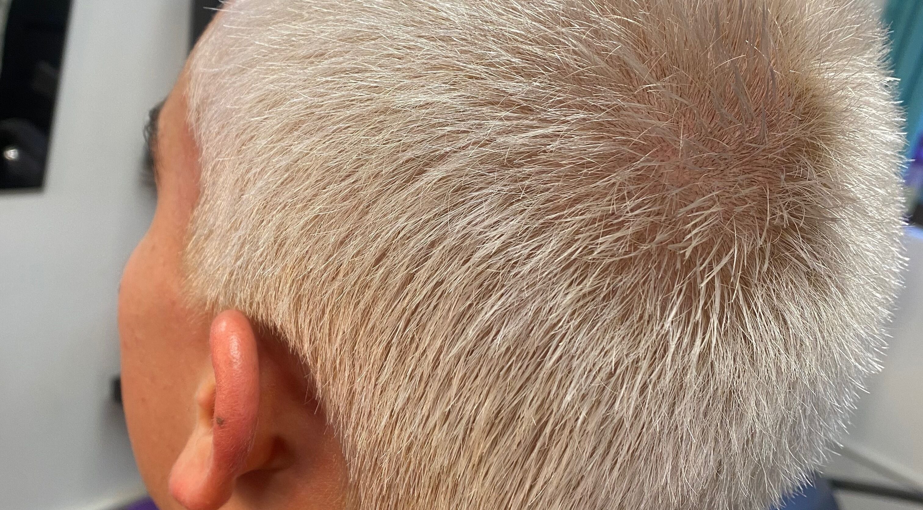 Close-up of a trendy blonde hairstyle at Hair Trendz by Crystal, Ballito, Kwazulu-Natal, ZA.