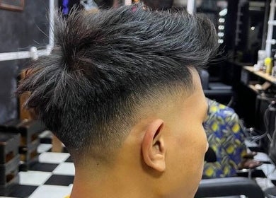 Modern fade haircut at Pablo Barbershop in Petaling Jaya, Selangor, MY. Experience expert styling today.