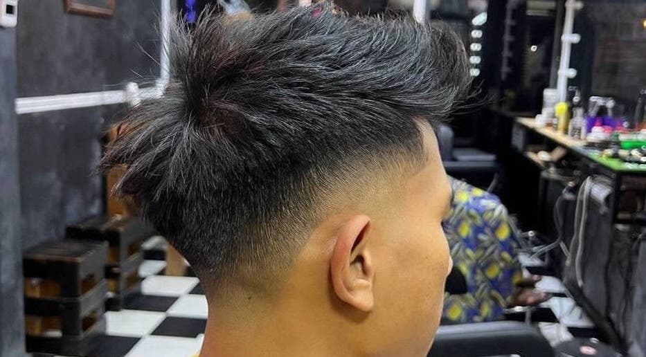 Modern fade haircut at Pablo Barbershop in Petaling Jaya, Selangor, MY. Experience expert styling today.