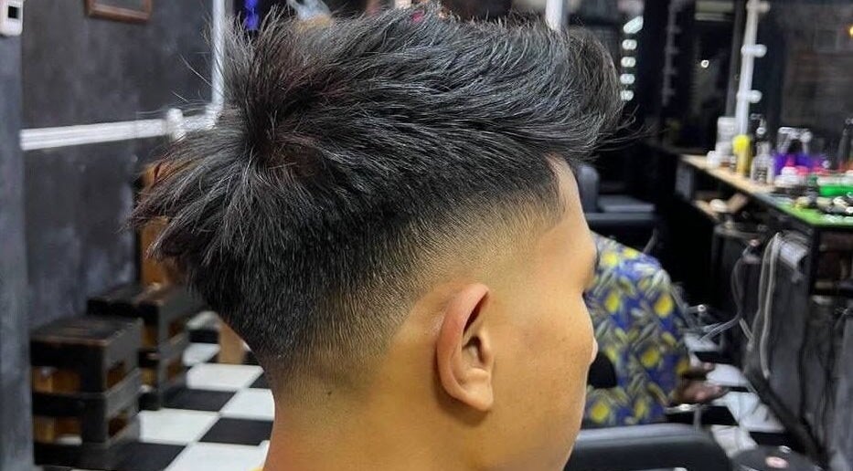 Modern fade haircut at Pablo Barbershop in Petaling Jaya, Selangor, MY. Experience expert styling today.