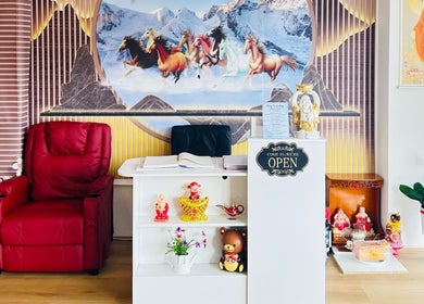 Relaxing reception area at Garden Beauty and Spa, Riverwood, New South Wales, AU, showcasing warm decor and comfort.