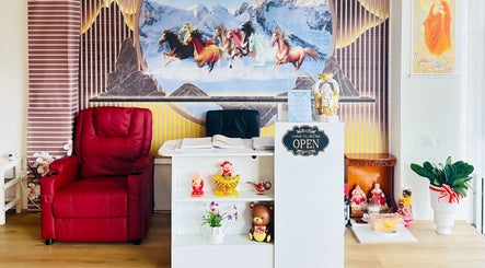 Relaxing reception area at Garden Beauty and Spa, Riverwood, New South Wales, AU, showcasing warm decor and comfort.
