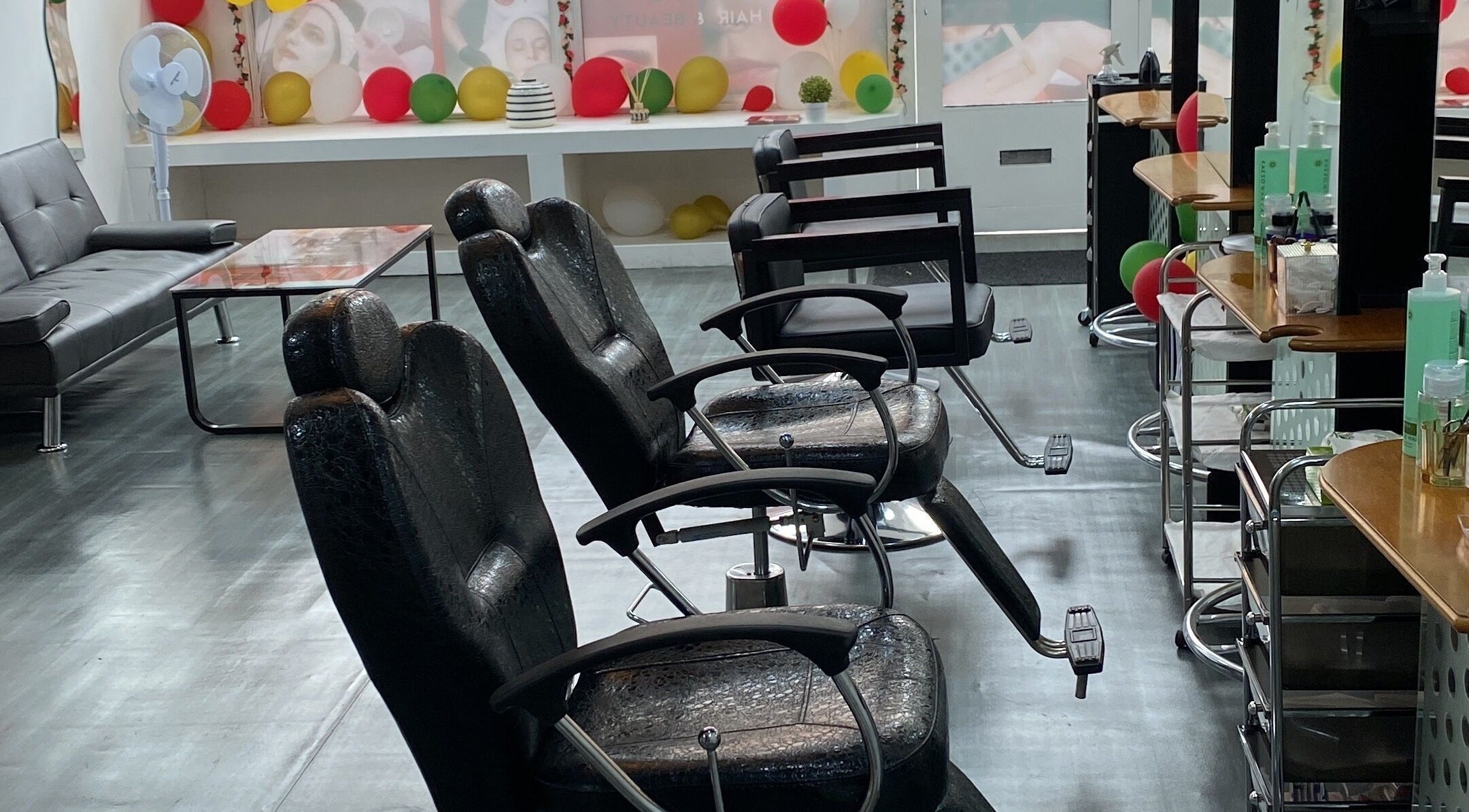 Modern salon chairs at Noks Hair and Beauty in Southend-on-sea, England, GB, offering comfort and style.