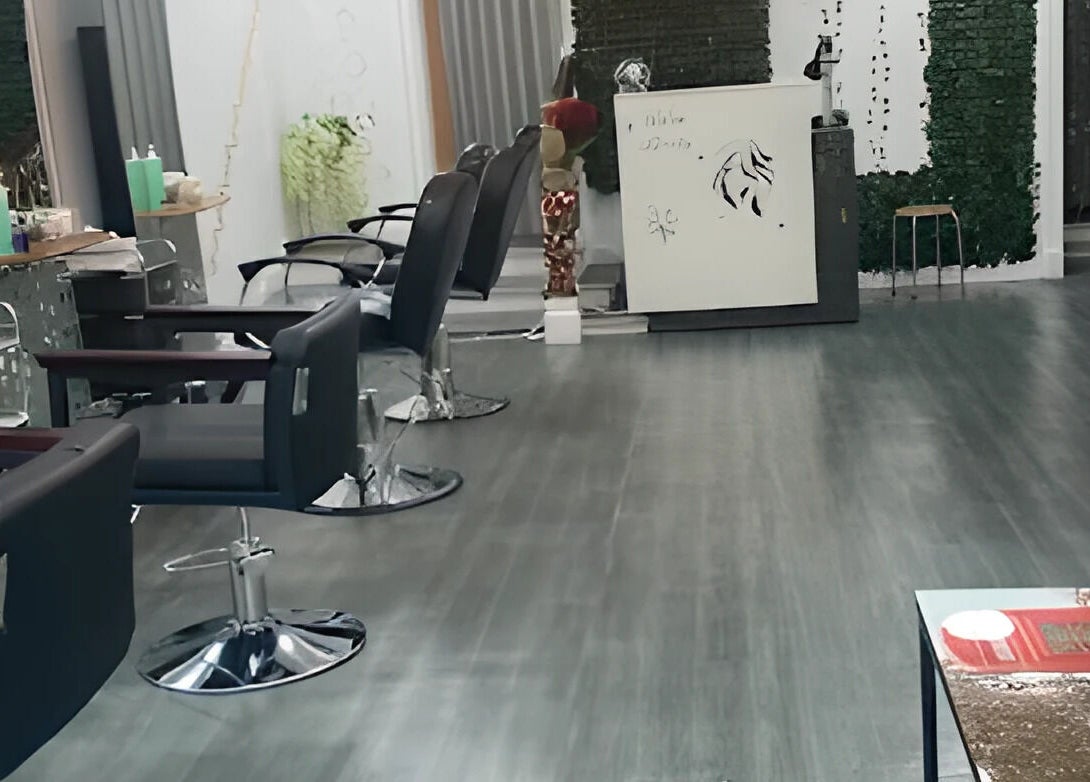 Contemporary interior of Noks Hair and Beauty in Southend-on-sea, England, GB with chic styling chairs.