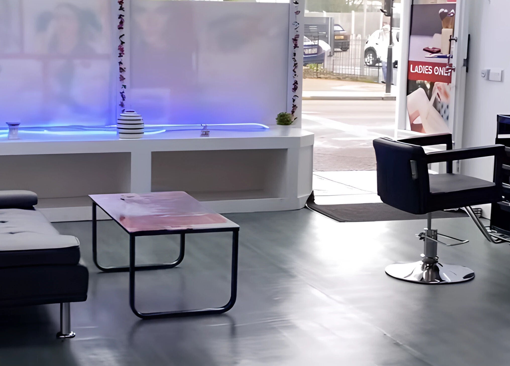 Modern salon interior at Noks Hair and Beauty, Southend-on-sea, England, GB, featuring stylish seating and decor.