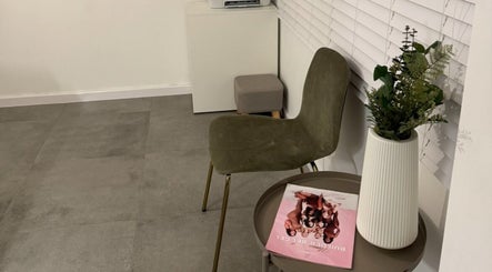 Calming waiting area at Beauty By Imogen, Oxspring, England featuring stylish decor and seating.