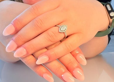 Manicured hands with elegant nails and ring at Beauty By Imogen, Oxspring, England, GB.