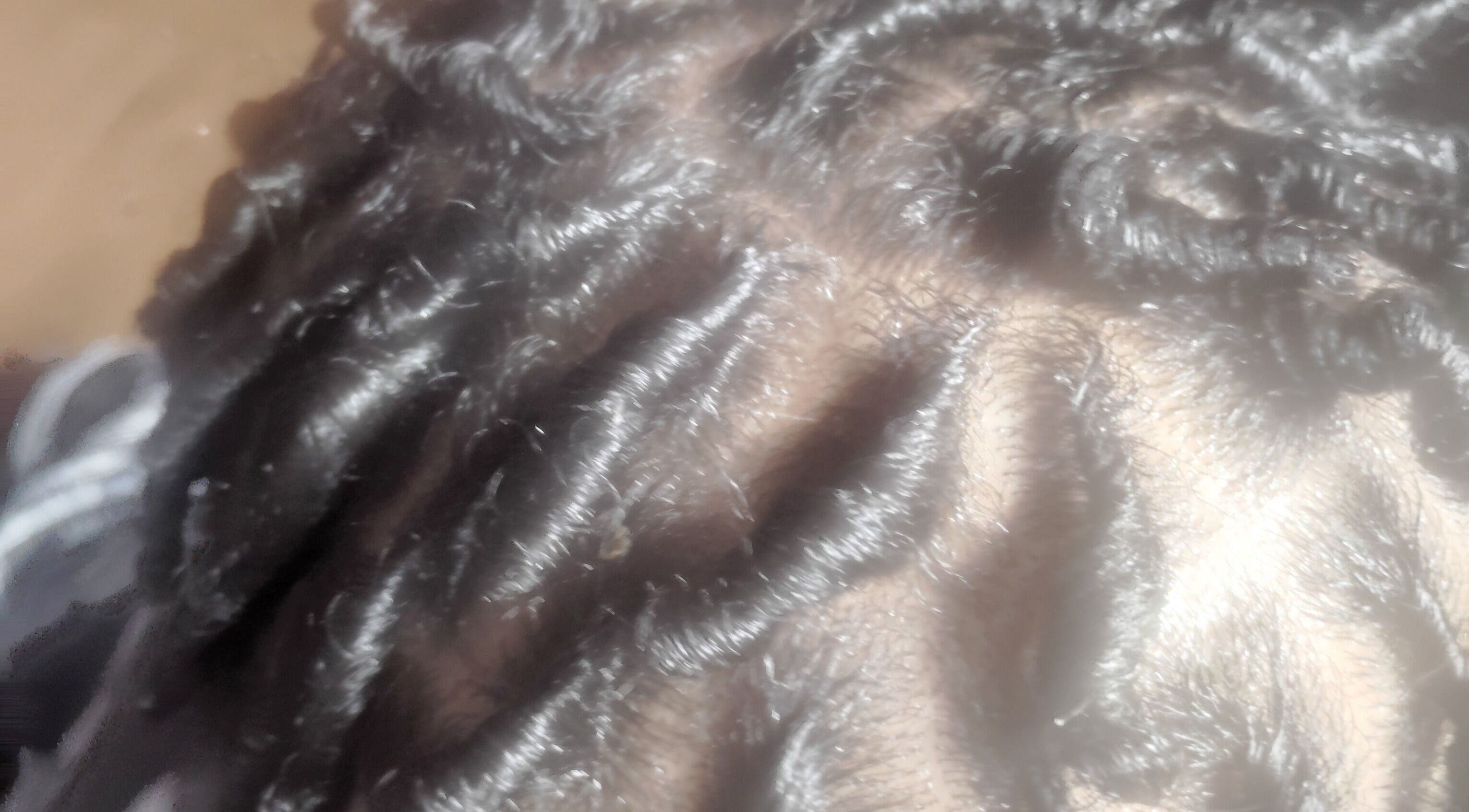 Close-up of sleek braids at Carolyn's Hair Fashion and Spa in Opelousas, Louisiana, US.