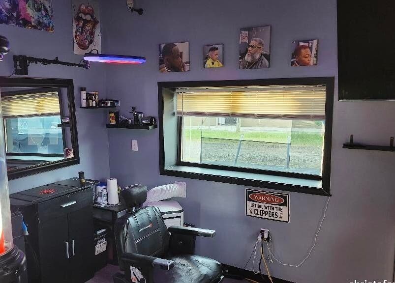 Interior of Christofer Styles Grooming LLC in College Park, Georgia, US, featuring a comfortable barber chair.