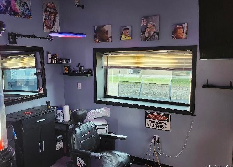 Interior of Christofer Styles Grooming LLC in College Park, Georgia, US, featuring a comfortable barber chair.