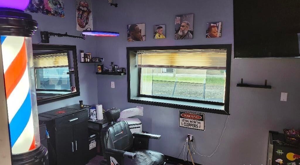 Interior of Christofer Styles Grooming LLC in College Park, Georgia, US, featuring a comfortable barber chair.