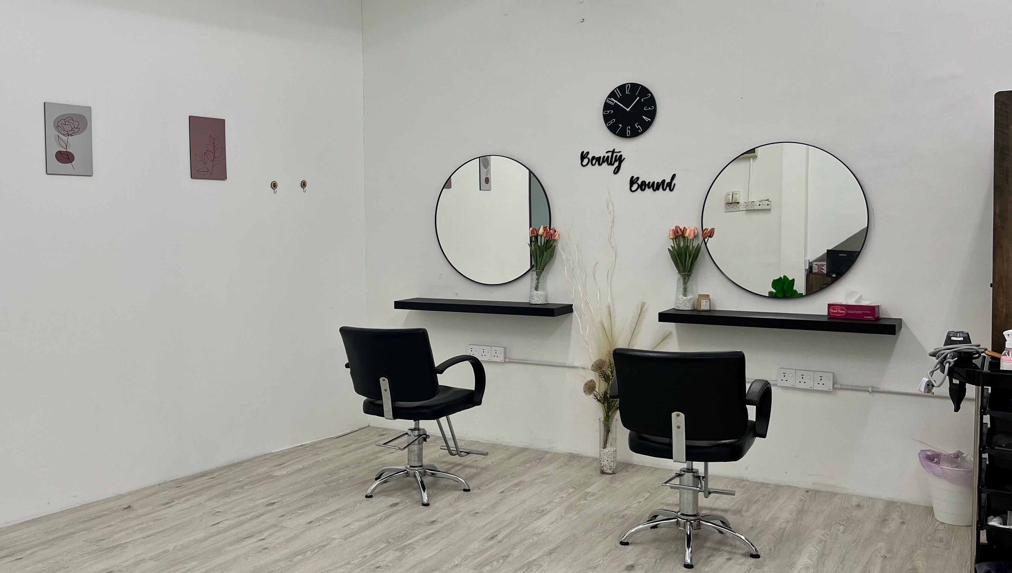 Beauty Bound salon interior with stylish chairs and mirrors in Sitiawan, Perak, MY.