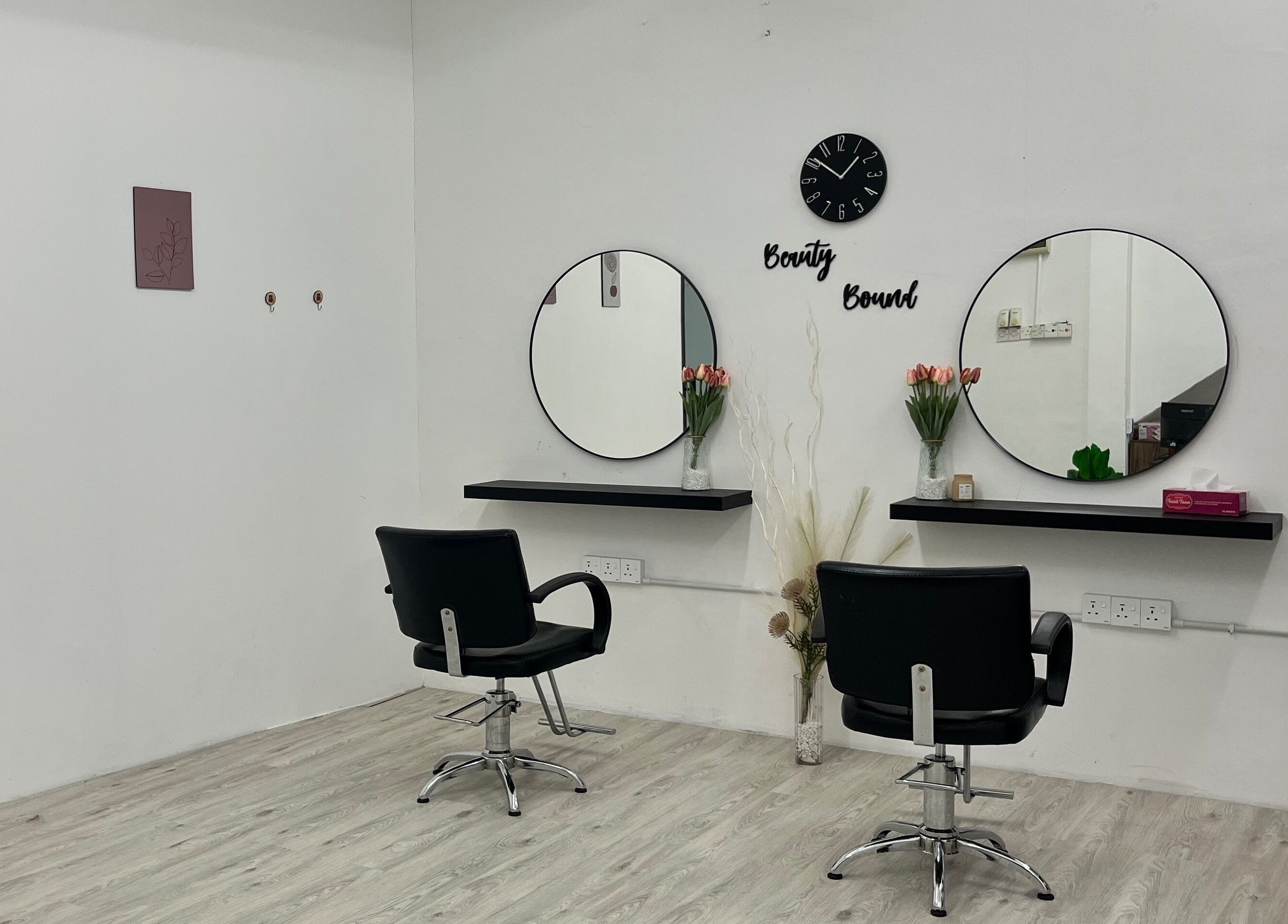 Beauty Bound salon interior with stylish chairs and mirrors in Sitiawan, Perak, MY.