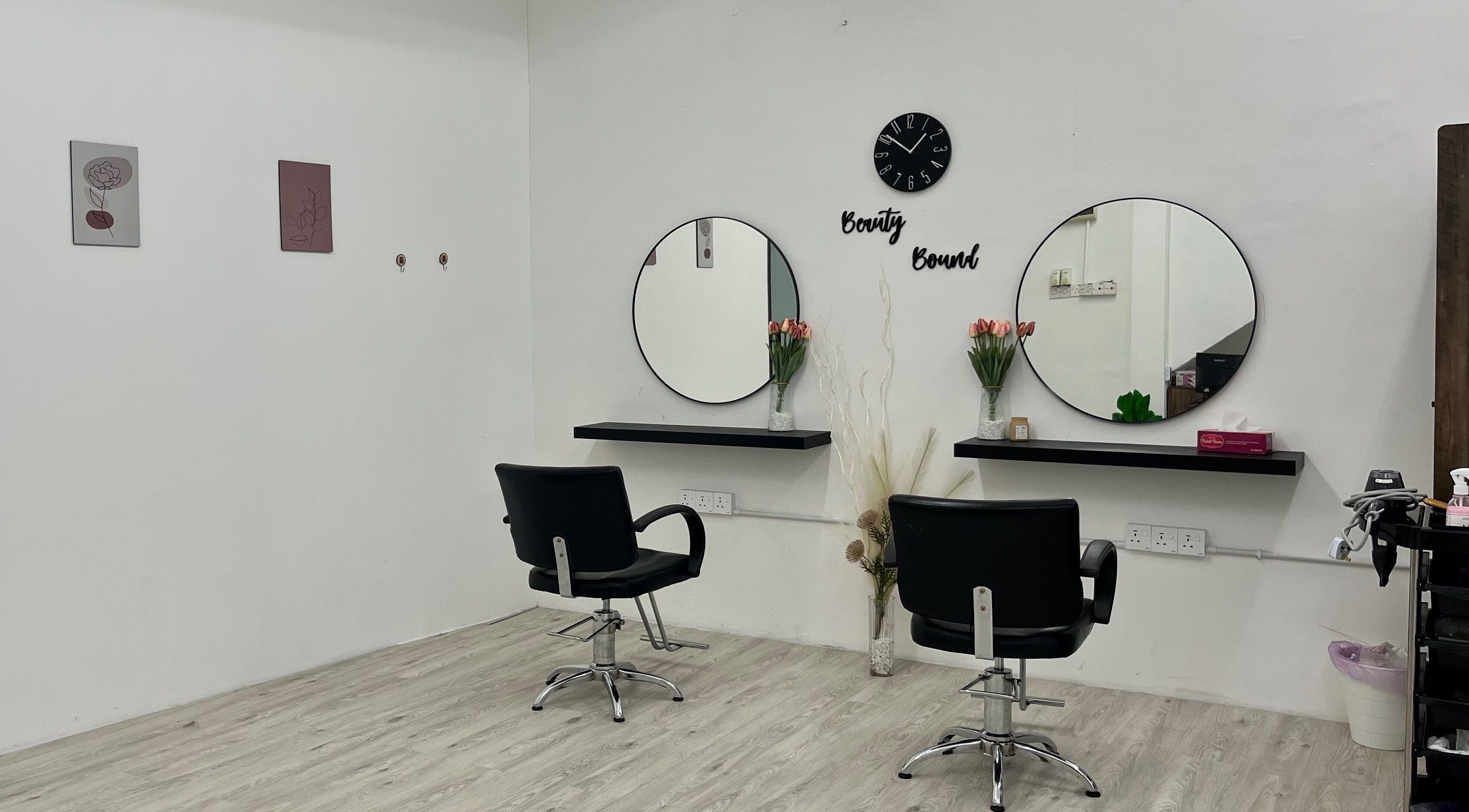 Beauty Bound salon interior with stylish chairs and mirrors in Sitiawan, Perak, MY.
