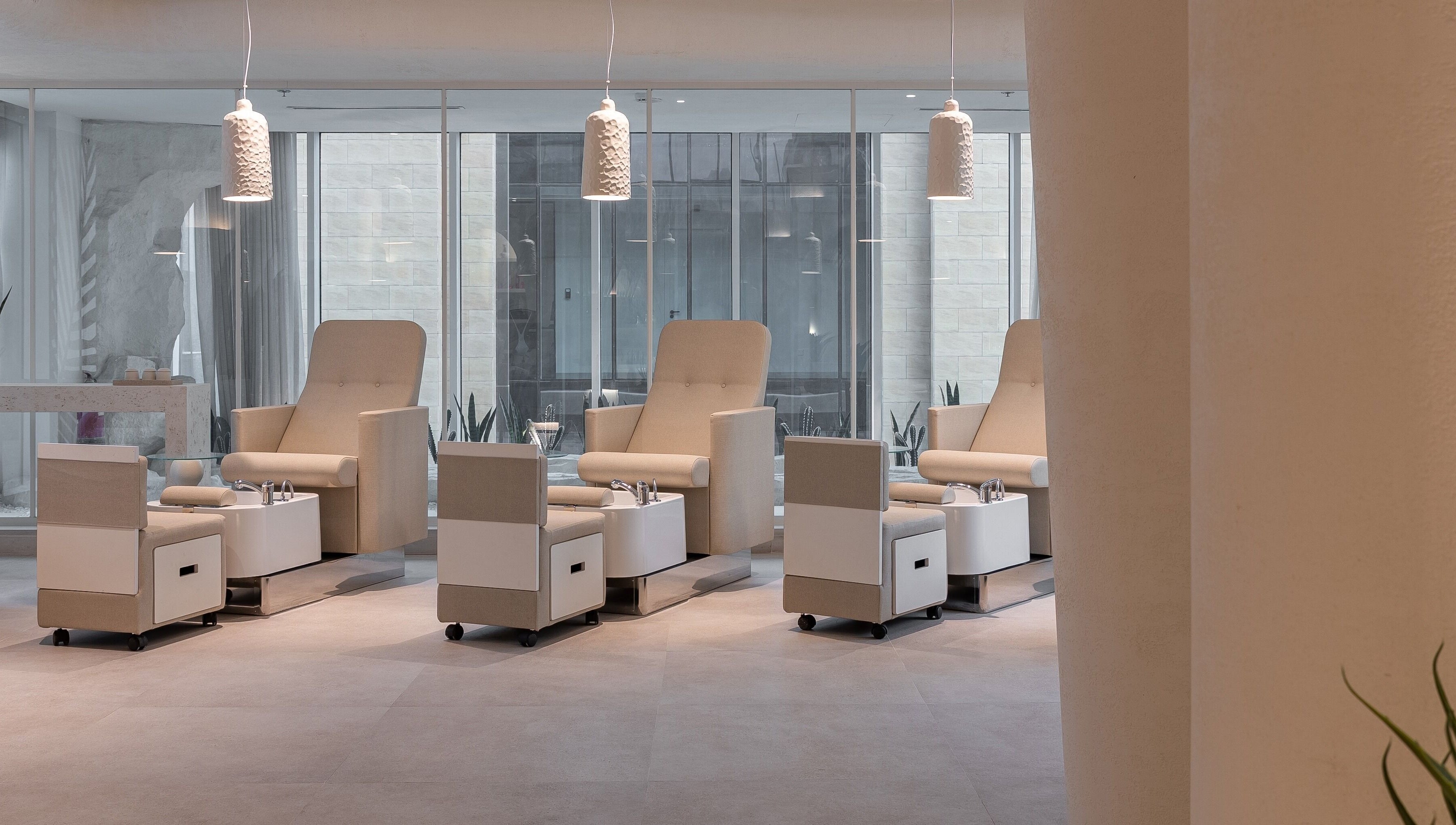 Elegant treatment chairs at Treat Men's Luxury Spa in Riyadh, Riyadh Province, SA offering top-notch relaxation.