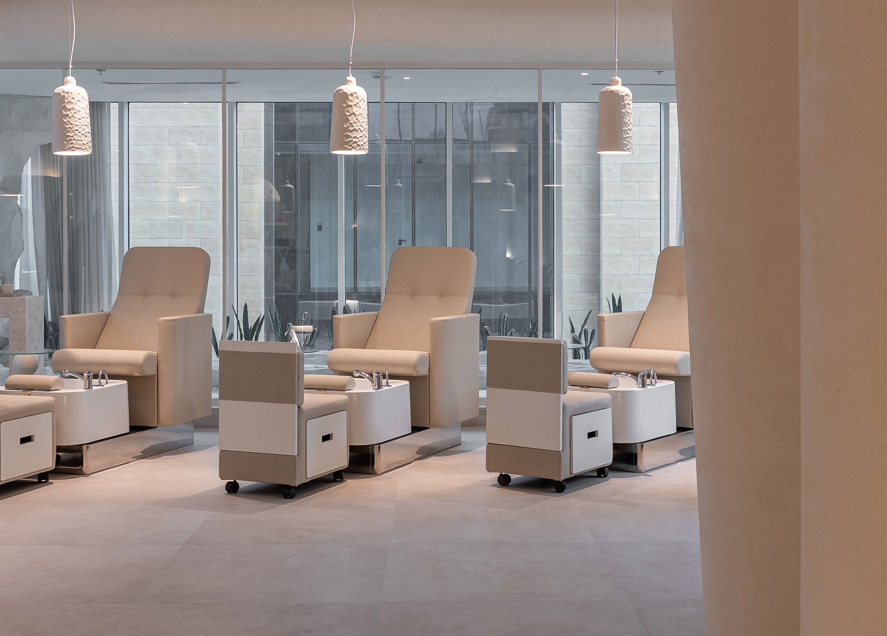 Elegant treatment chairs at Treat Men's Luxury Spa in Riyadh, Riyadh Province, SA offering top-notch relaxation.
