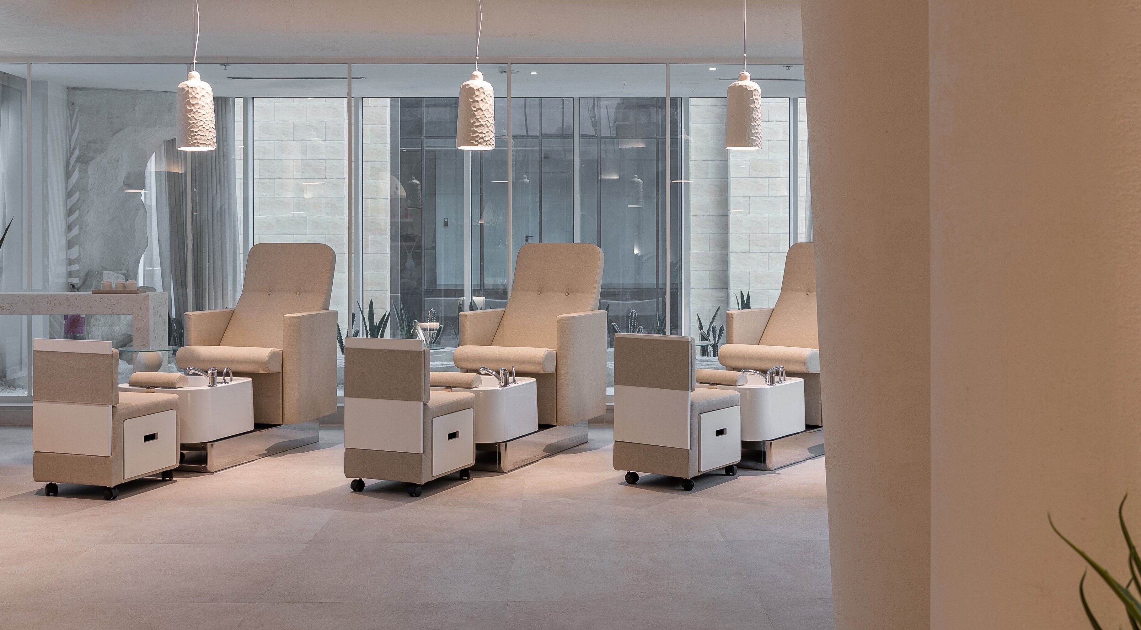 Elegant treatment chairs at Treat Men's Luxury Spa in Riyadh, Riyadh Province, SA offering top-notch relaxation.