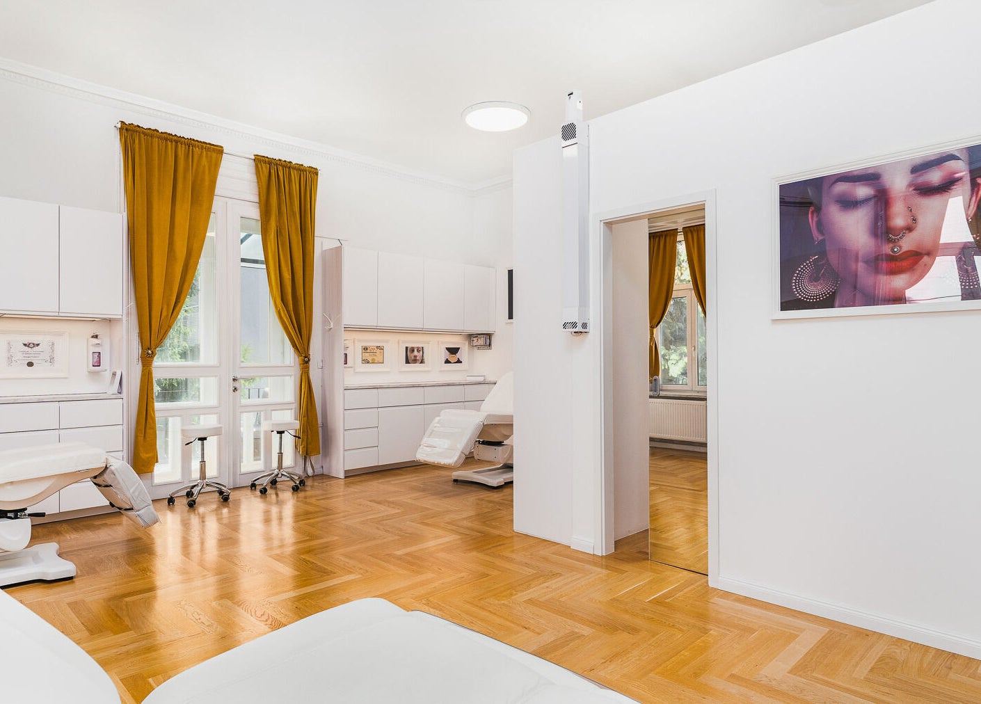 Modern studio at Octopus Piercing & Tattoo in Zagreb, Grad Zagreb, HR with stylish decor and yellow curtains.