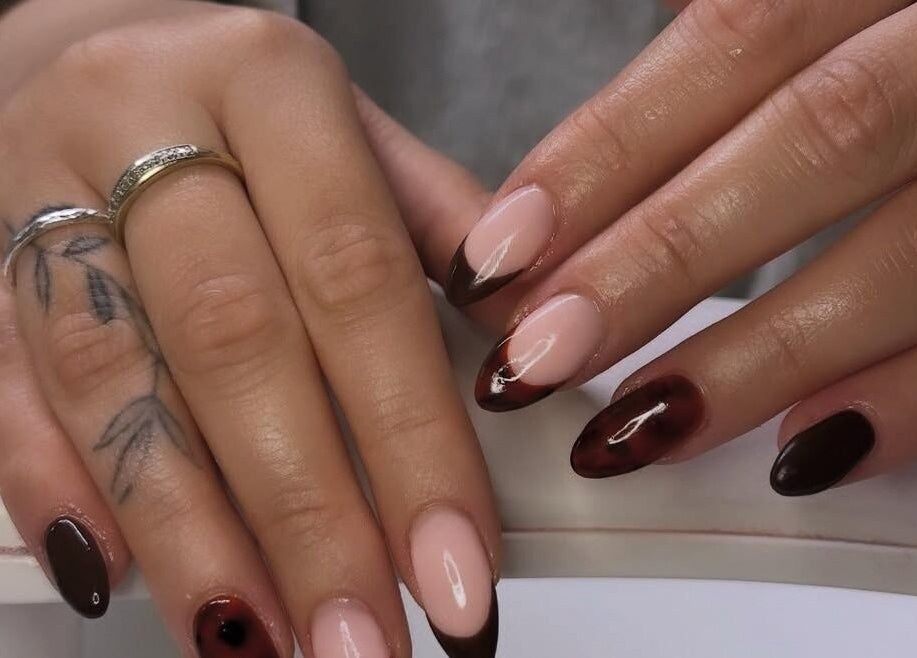 Elegant manicure with brown and nude design at Gossip & Glamour, Chippenham, England, GB.