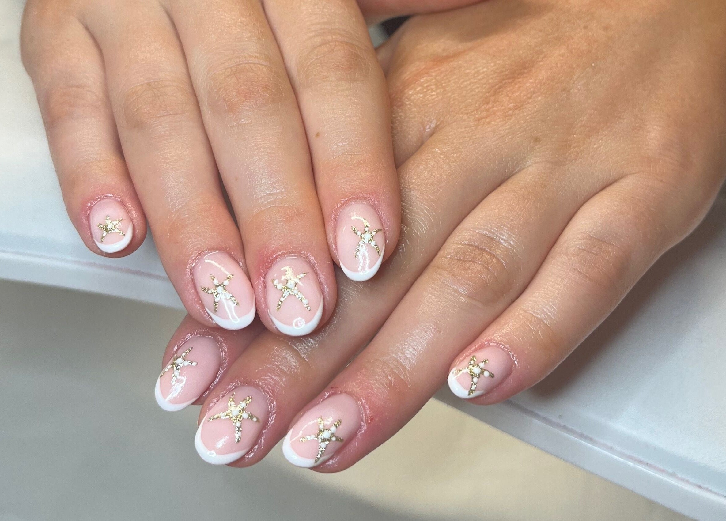 Elegant star-themed nail art at Gossip & Glamour, Chippenham, England, GB.