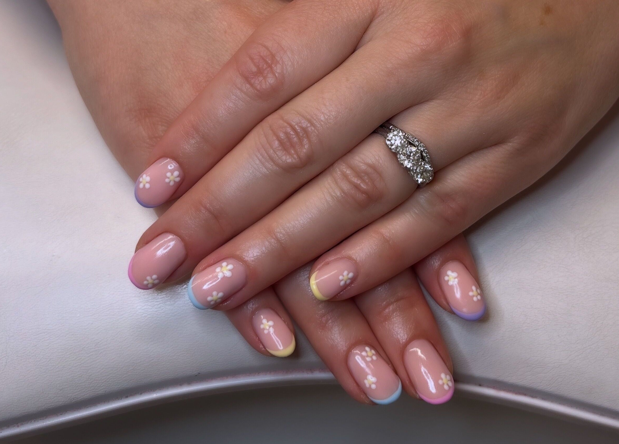 Elegant floral nail art at Gossip & Glamour, Chippenham, England, GB.
