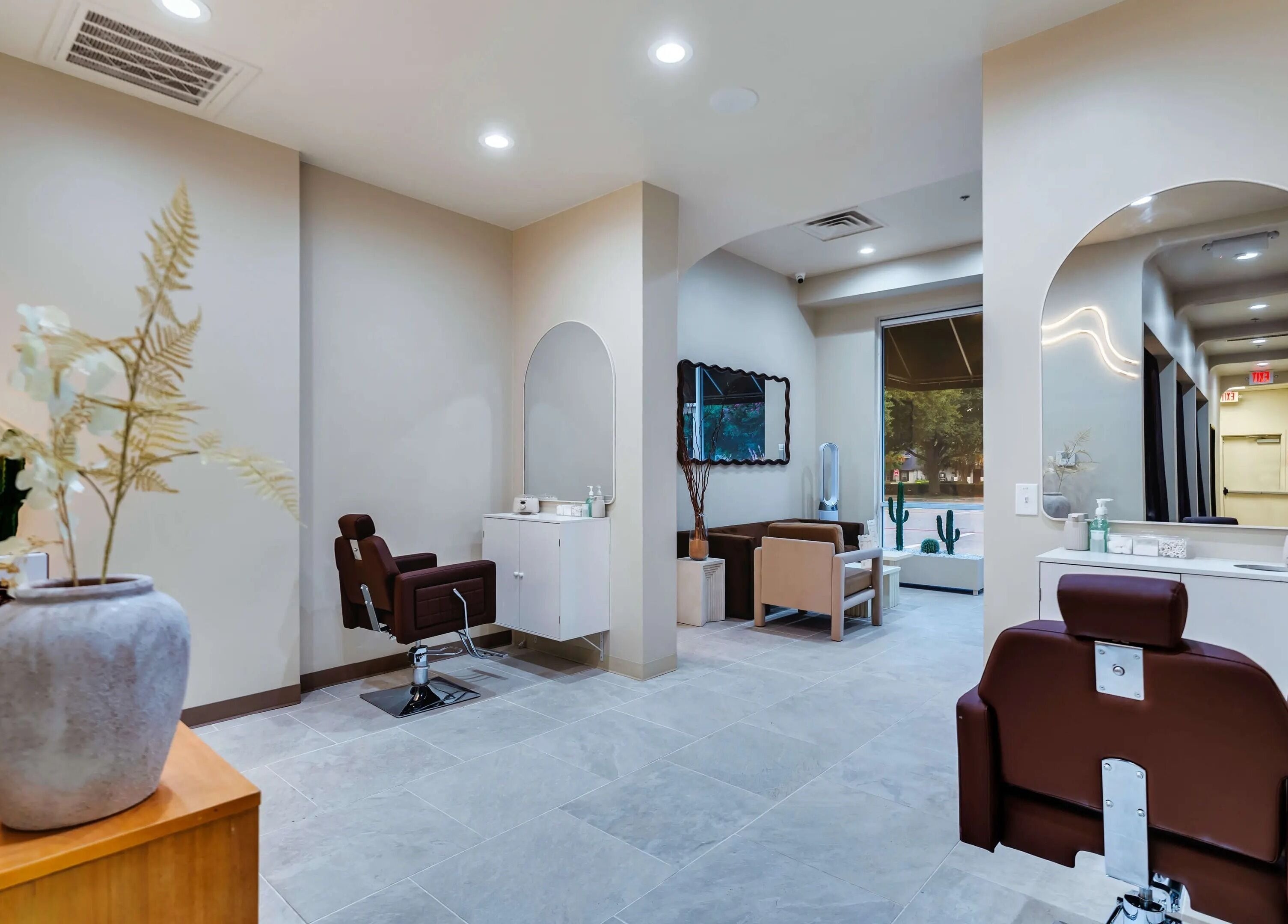 Tranquil interior of Korra Beauty Bar in Southlake, Texas, US, featuring stylish chairs and elegant decor.