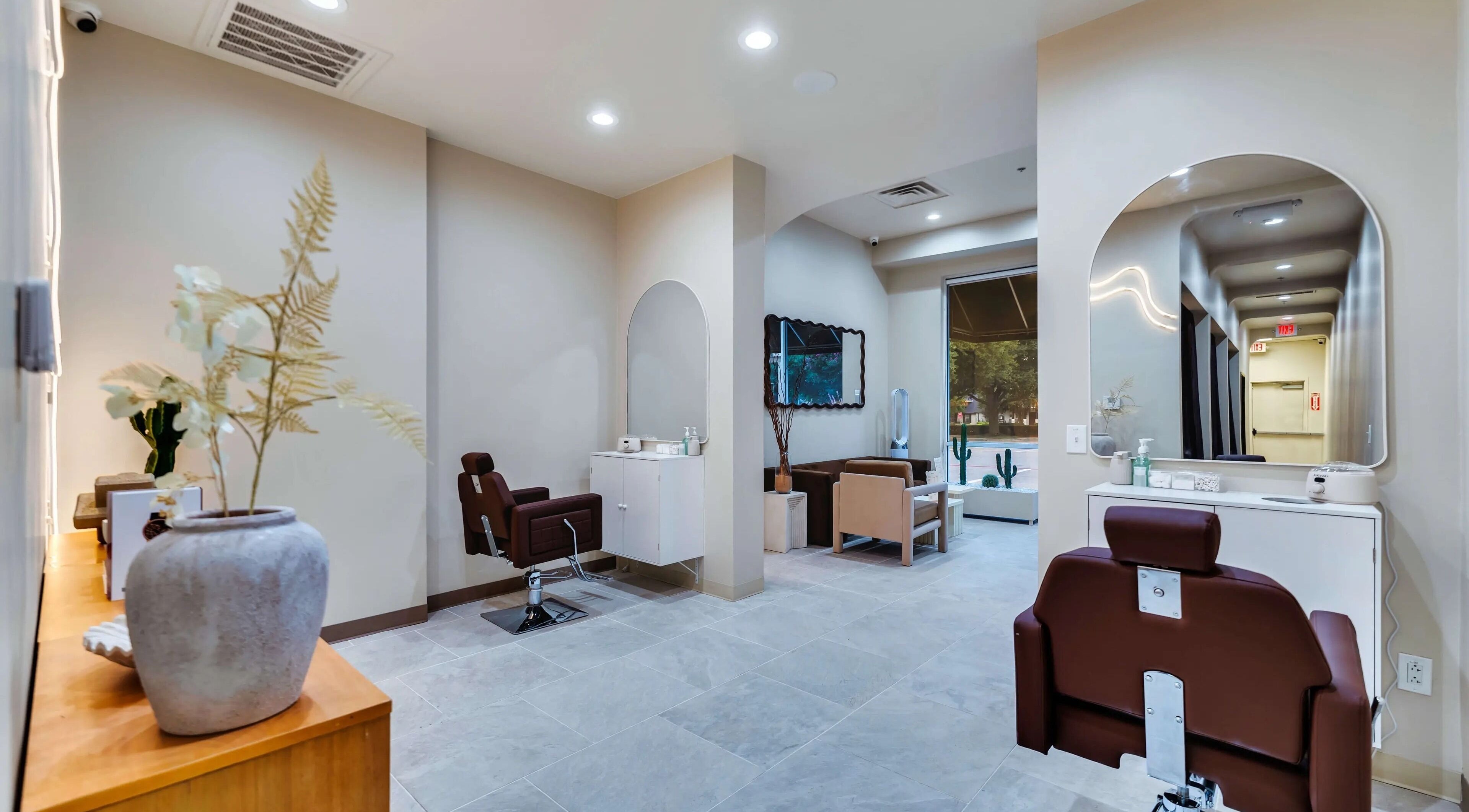 Tranquil interior of Korra Beauty Bar in Southlake, Texas, US, featuring stylish chairs and elegant decor.