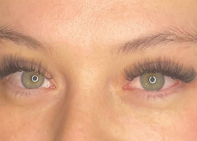 Close-up of lash extensions by Lashes By Lex (Mobile Lash Tech) in Giltbrook, England, GB enhancing green eyes.
