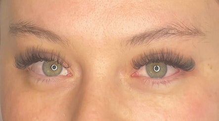 Close-up of lash extensions by Lashes By Lex (Mobile Lash Tech) in Giltbrook, England, GB enhancing green eyes.