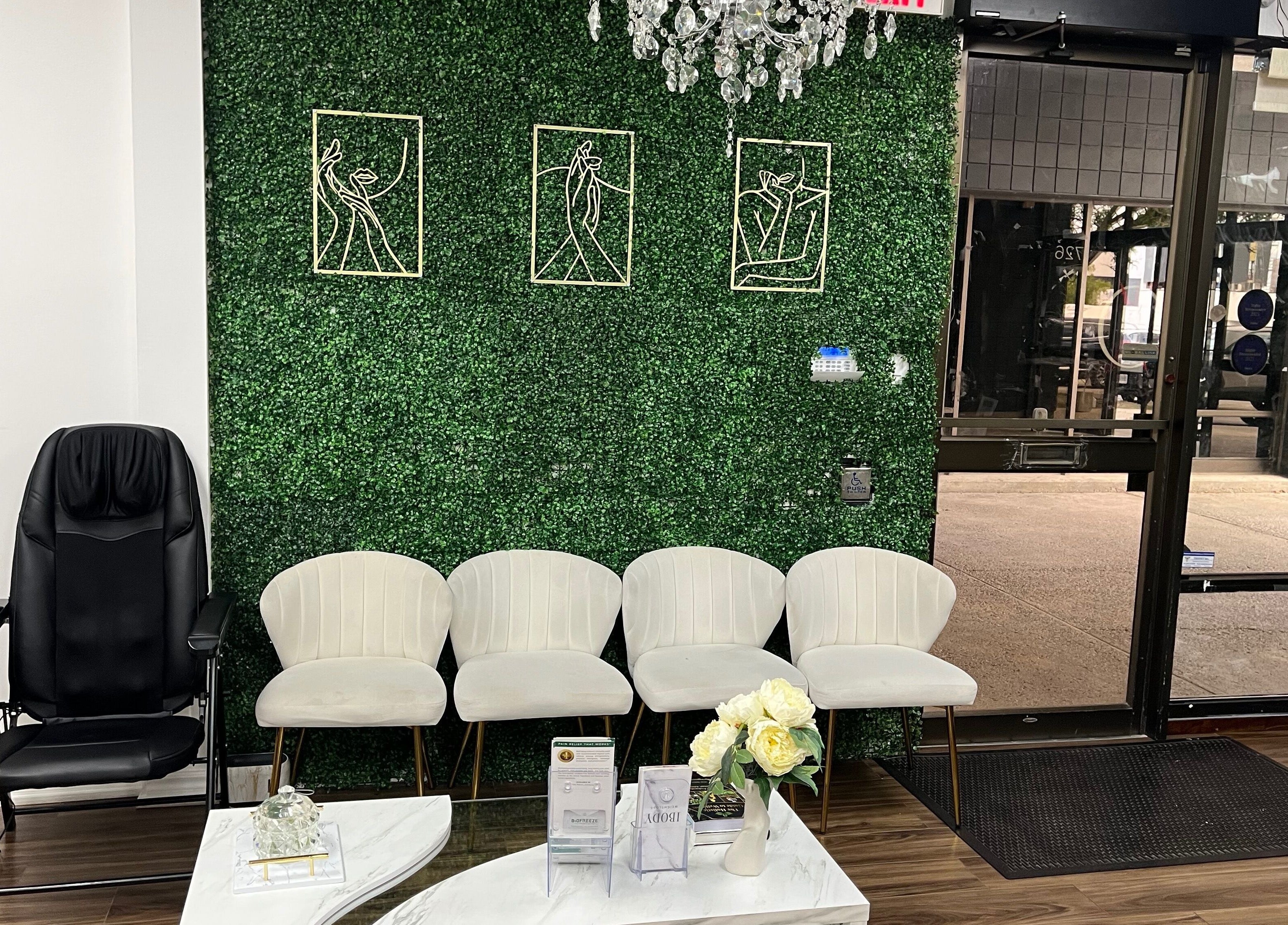 Chic waiting area at Silky Skin, Toronto, Ontario, CA, with modern decor and plush seating.
