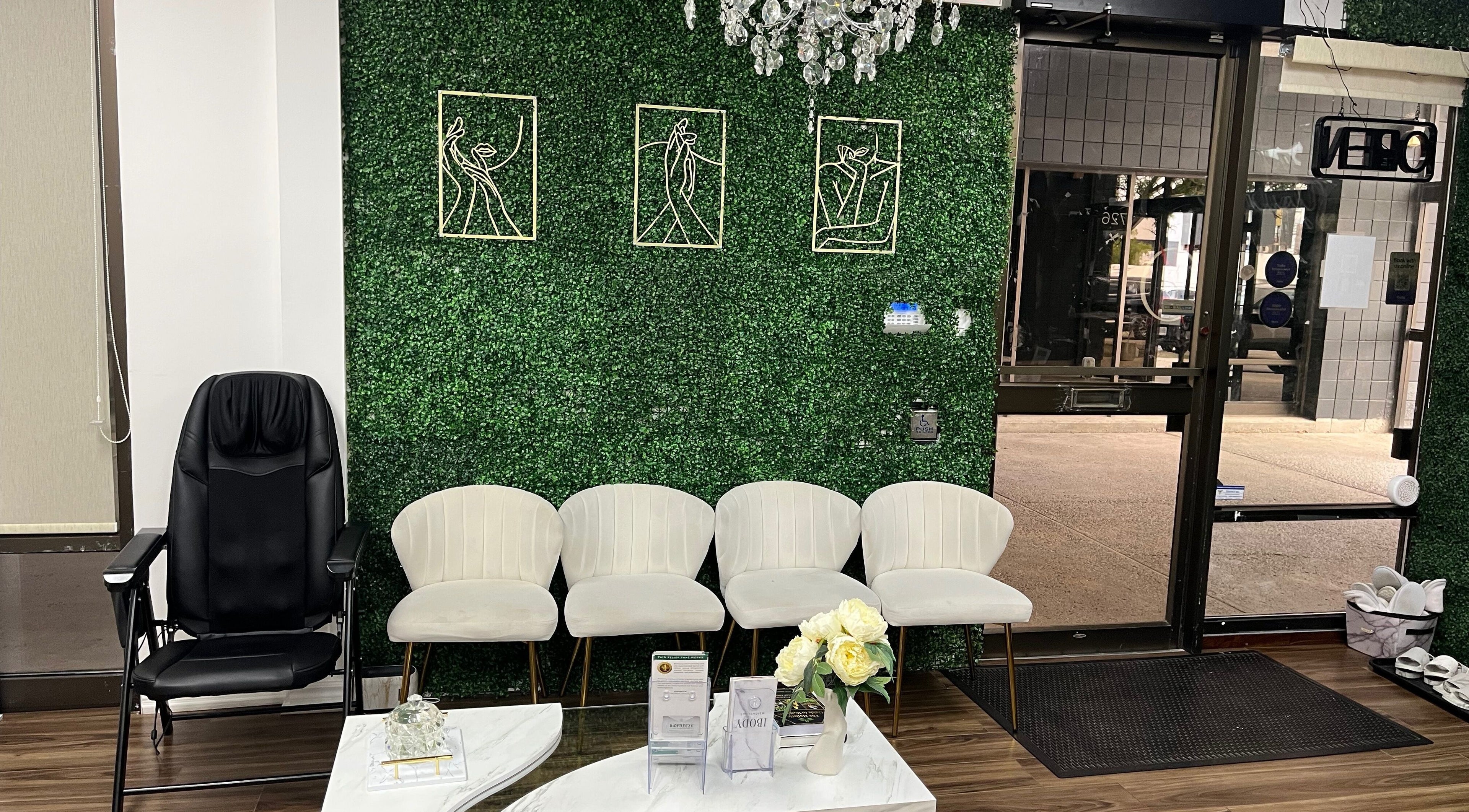 Chic waiting area at Silky Skin, Toronto, Ontario, CA, with modern decor and plush seating.