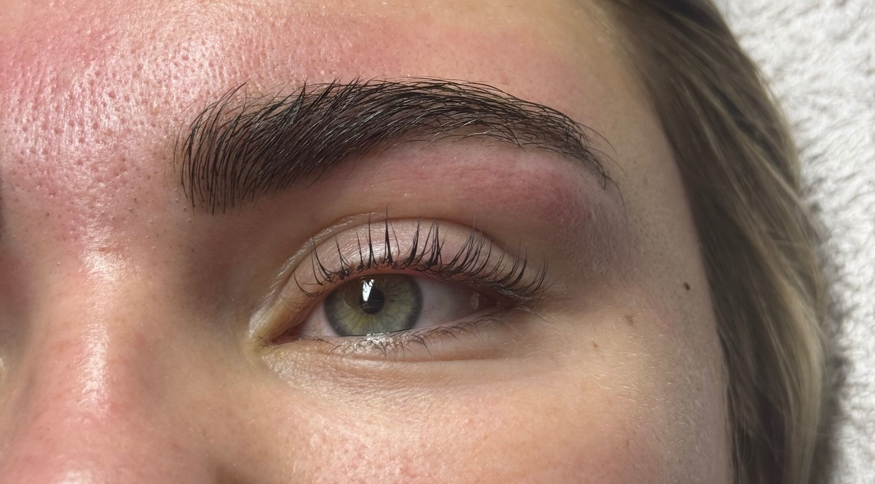 Close-up of perfectly shaped brows and lashes at A&E Aesthetics, Adelaide, South Australia, AU.