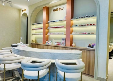 Chic nail bar inside Goldn Muse Beauty Salon, Dubai, Dubai, AE, featuring elegant seating and a wide polish selection.