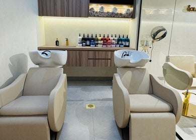 Modern wash stations at Goldn Muse Beauty Salon, Dubai, Dubai, AE, showcasing elegance and style.