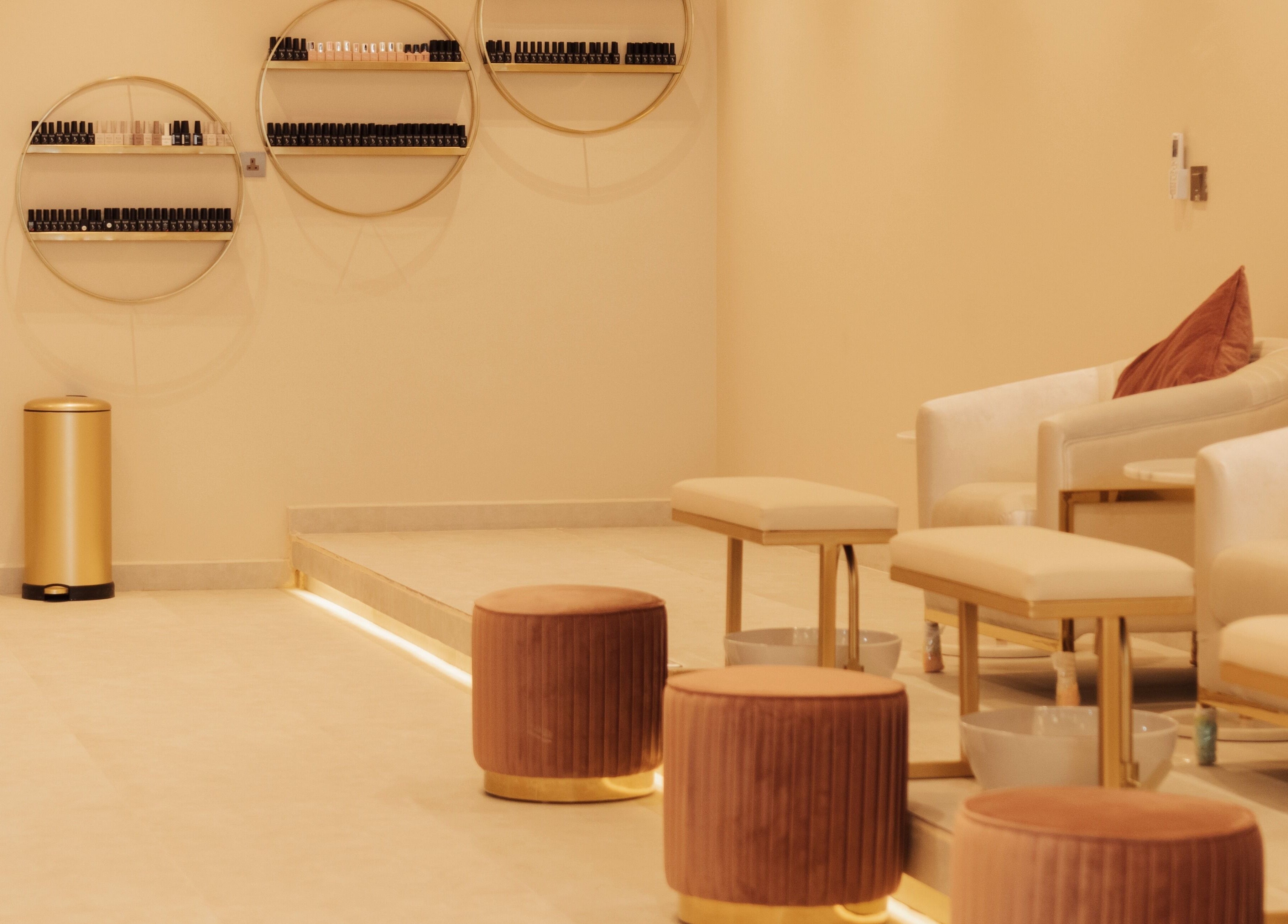 Infinity Nails pedicure lounge with plush seating in Riyadh, Riyadh Province, SA.