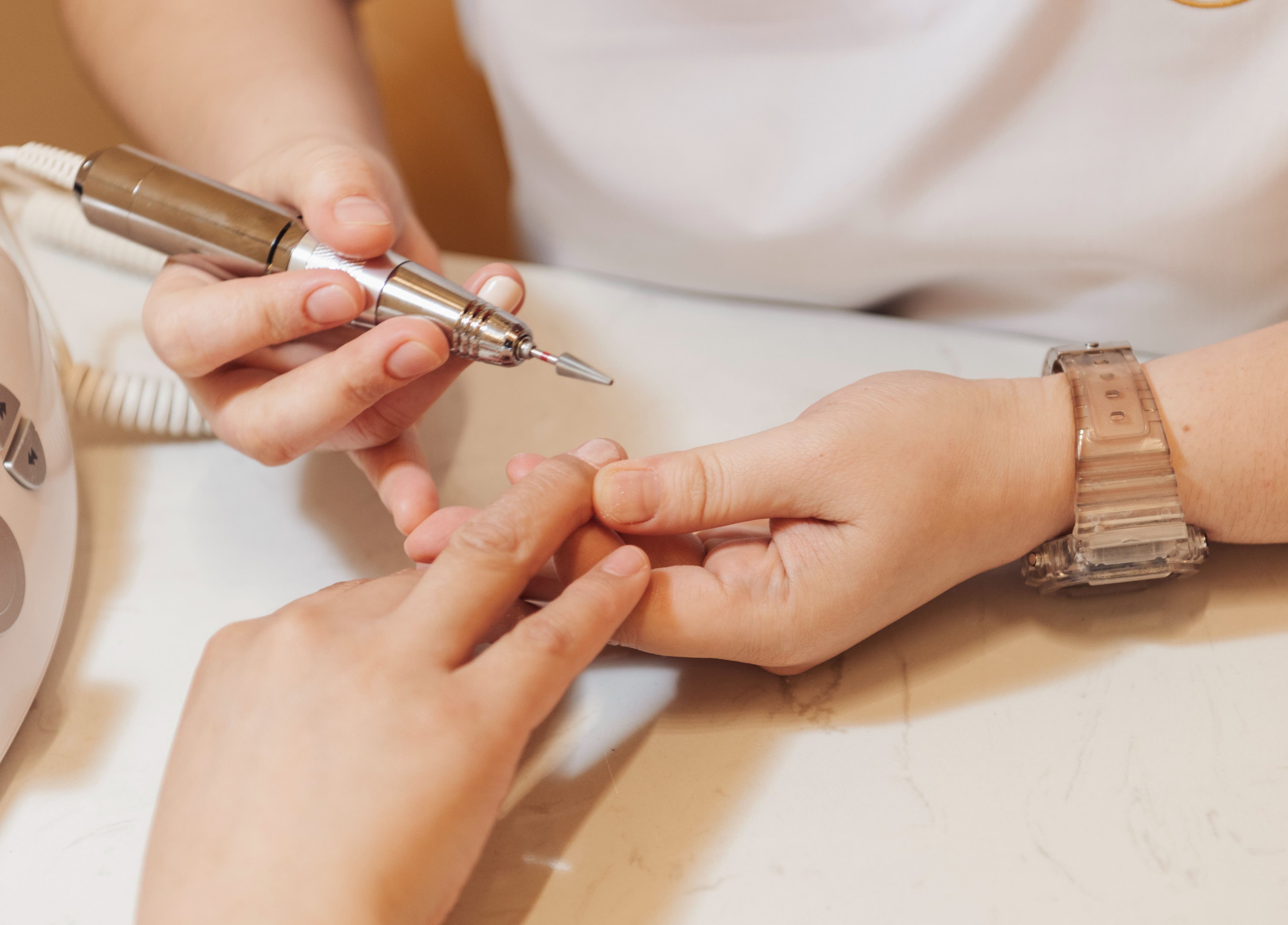 Precise manicure at Infinity Nails, Riyadh, Riyadh Province, SA, showcasing expert nail care.