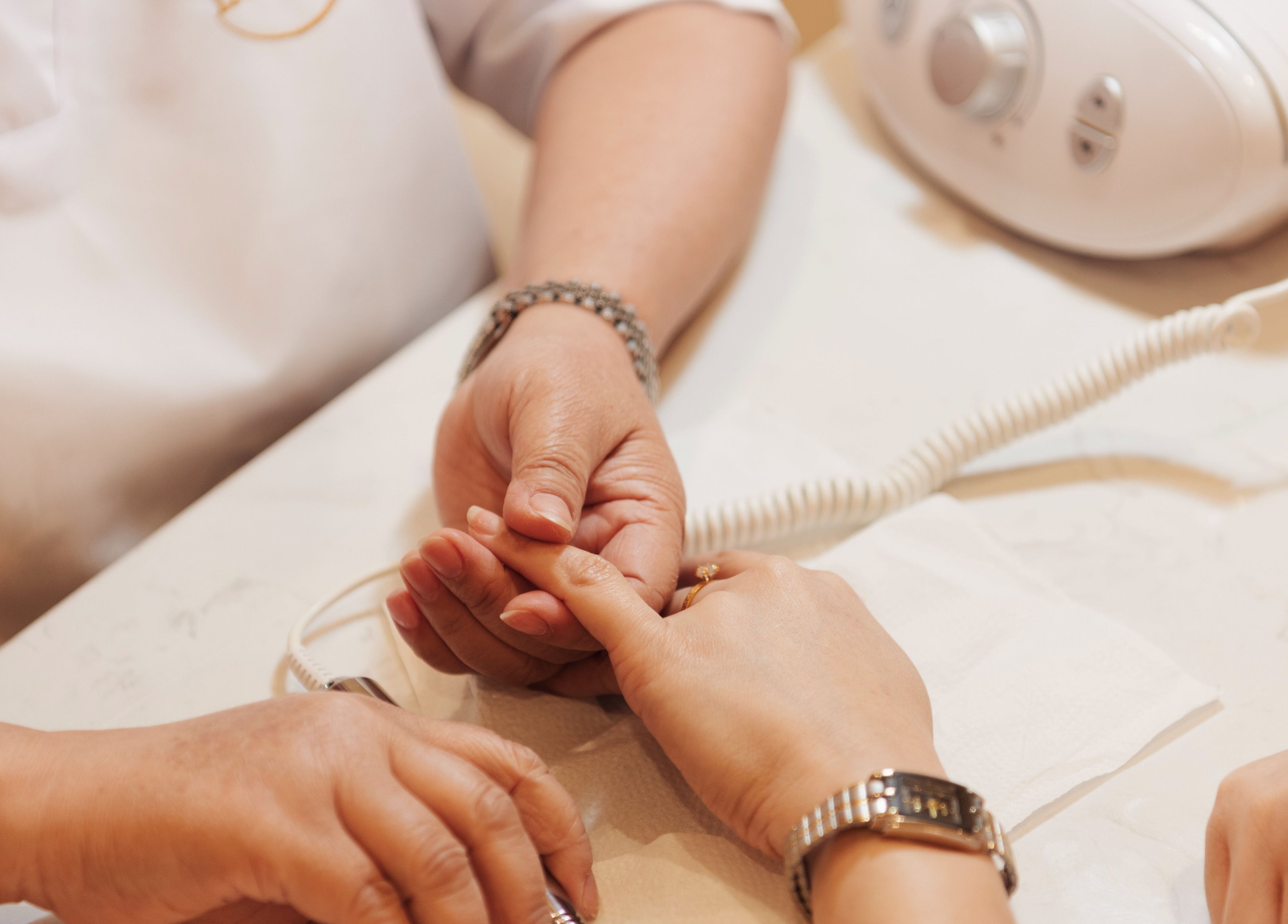 Performing a manicure at Infinity Nails, Riyadh, Riyadh Province, SA.