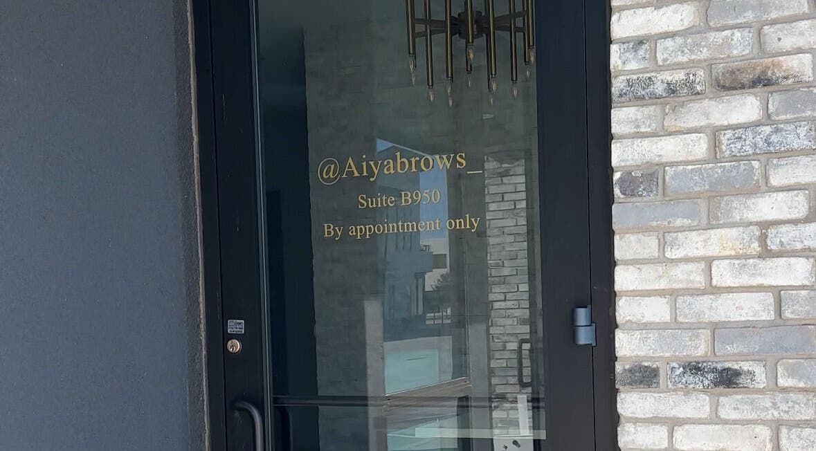 Entrance of D&E Esthetics Lash and Brows in Katy, Texas, US, showcasing suite B950 door.