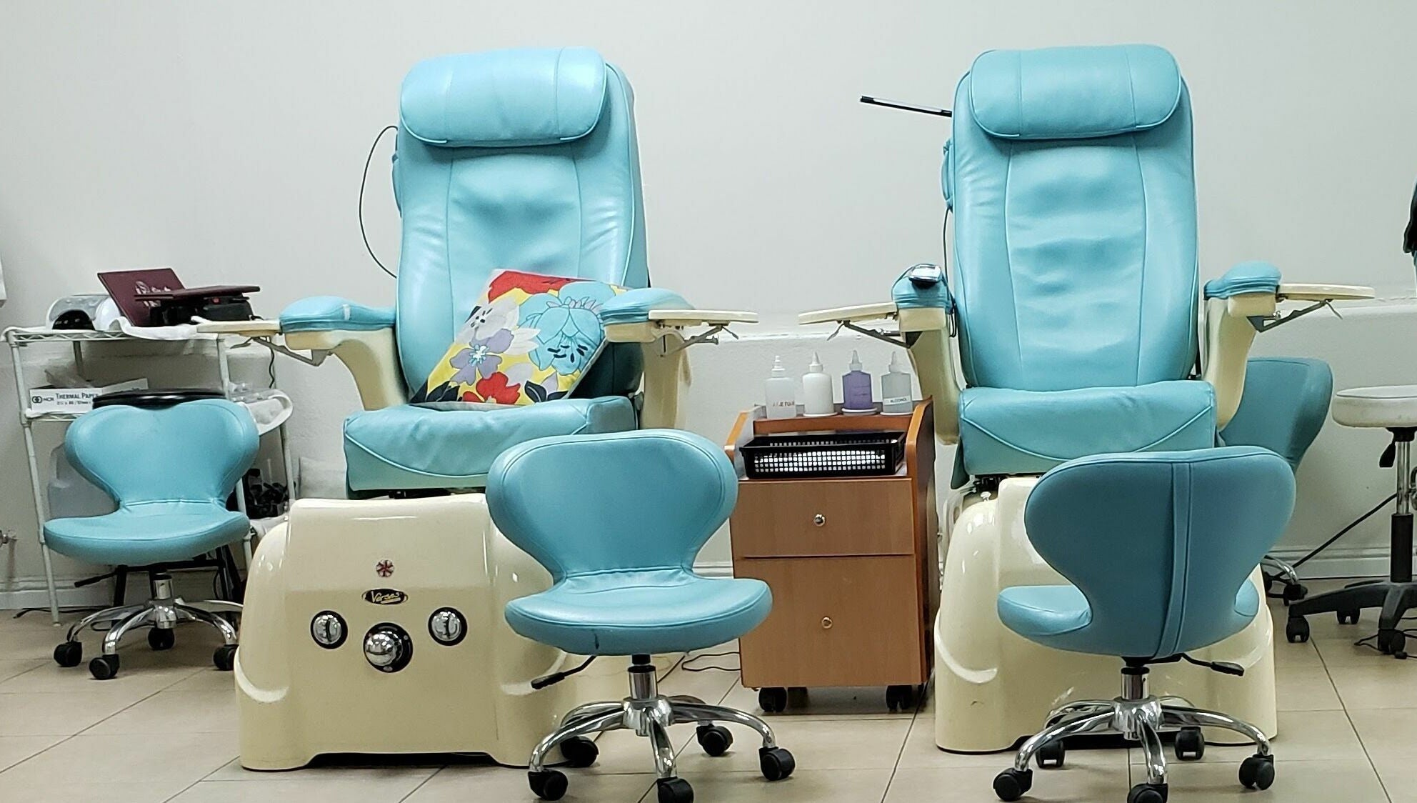 Comfortable pedicure chairs at Blue Bell Nails Salon in Livermore, California, US showcase a relaxing atmosphere.