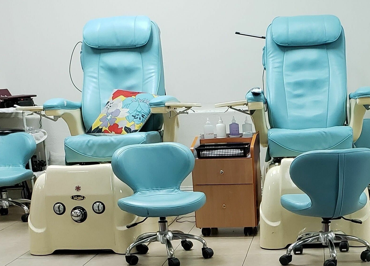Comfortable pedicure chairs at Blue Bell Nails Salon in Livermore, California, US showcase a relaxing atmosphere.