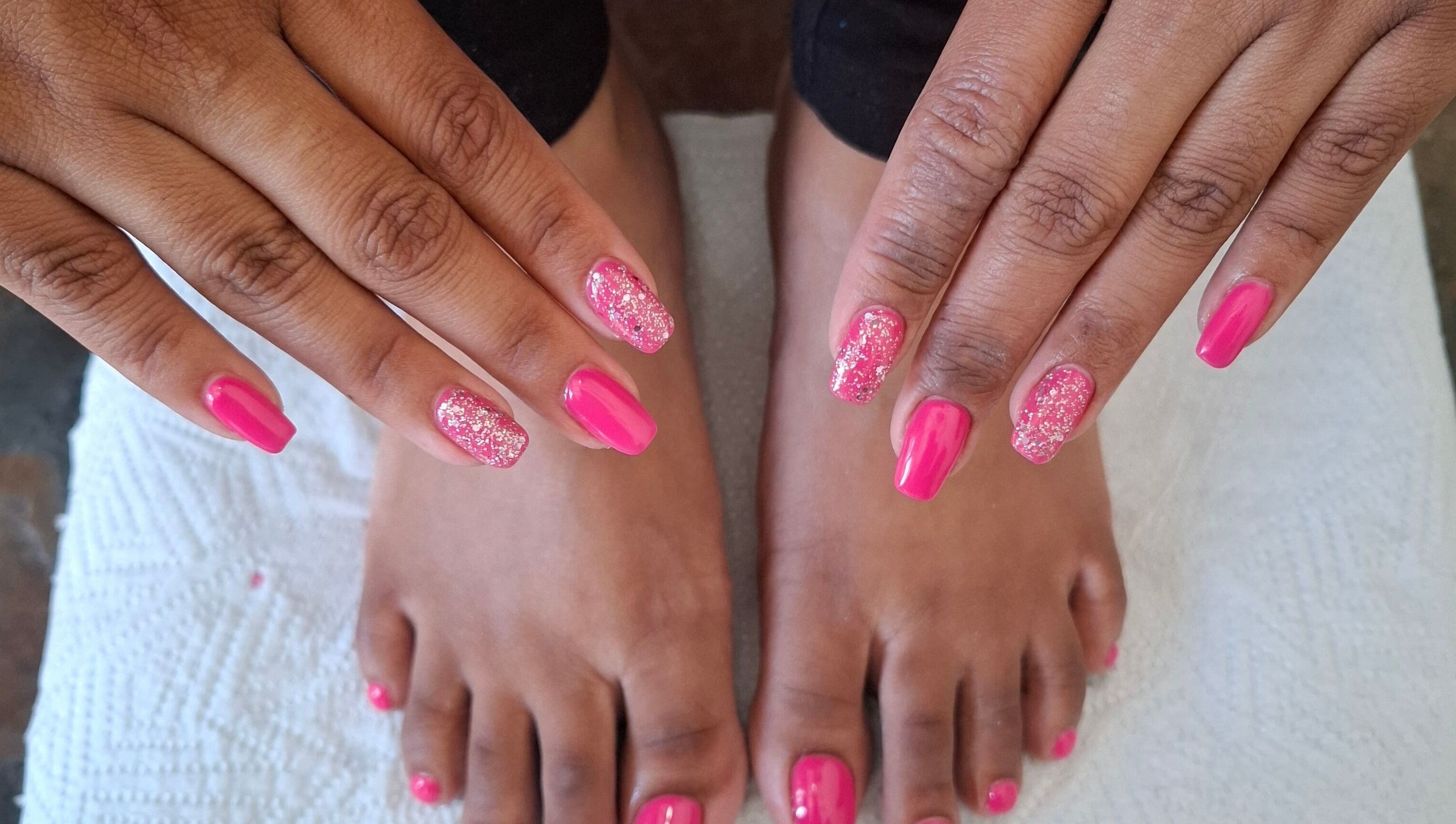 Pink glitter nails at House of Nails, Cape Town, Western Cape, ZA. Perfect blend of style and beauty.