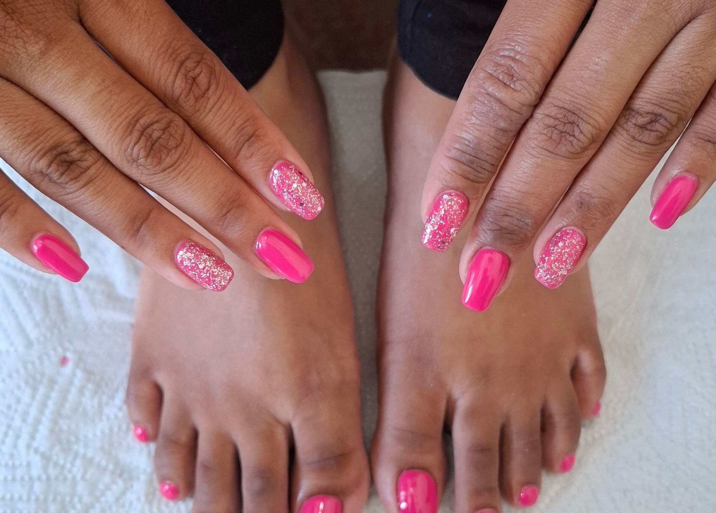 Pink glitter nails at House of Nails, Cape Town, Western Cape, ZA. Perfect blend of style and beauty.
