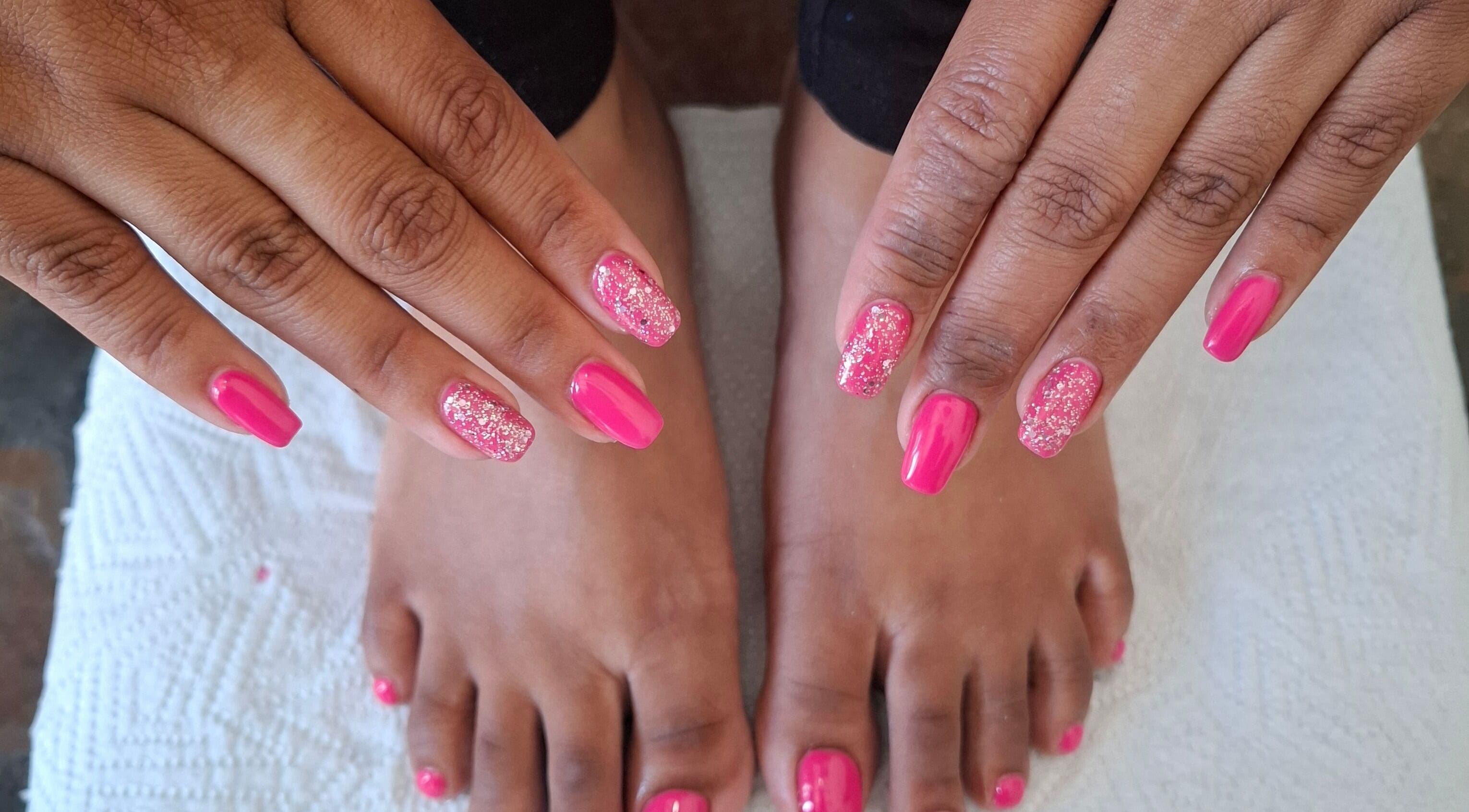 Pink glitter nails at House of Nails, Cape Town, Western Cape, ZA. Perfect blend of style and beauty.